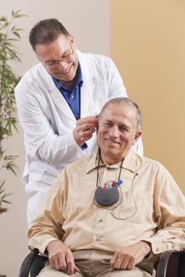 Batteries and repairs qualify as medical expenses along with your hearing aid purchase cost.
